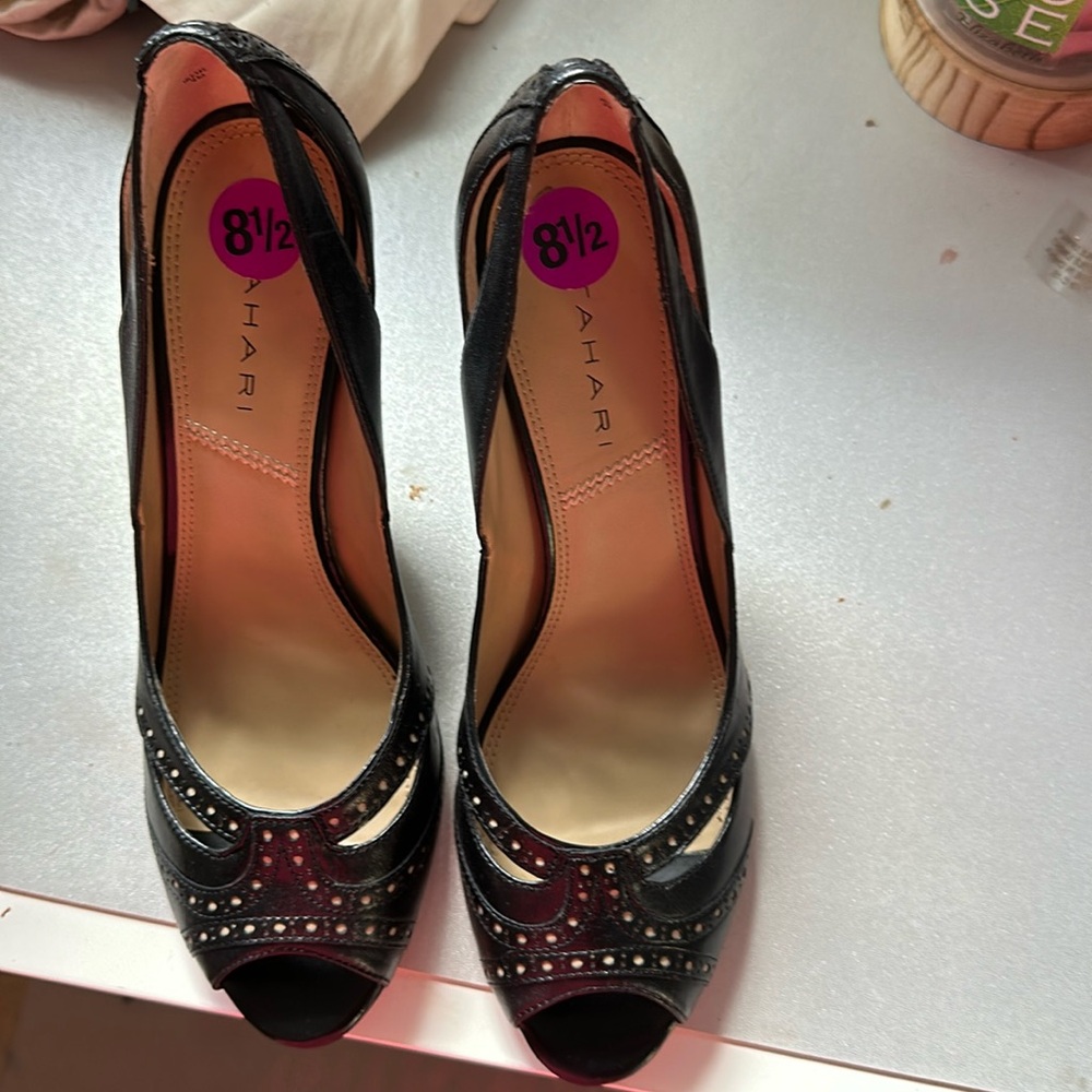 Tahari heels has been used only once. Excellent condition